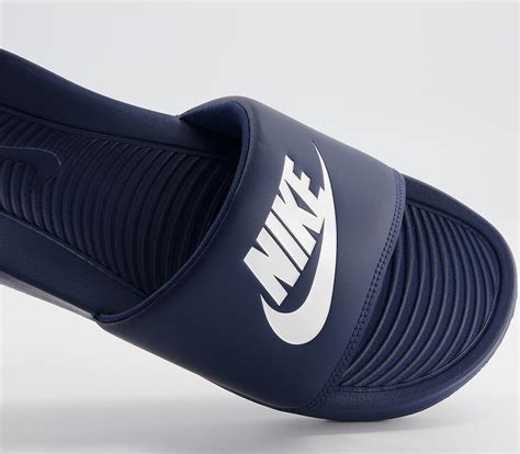 nike slides navy blue.